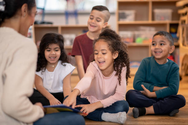 istock Multi-Ethnic Daycare Story Time 1344864112