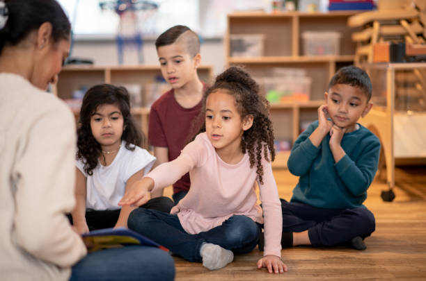 istock Multi-Ethnic Daycare Story Time 1344864118