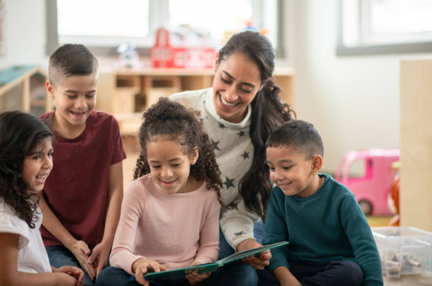 istock Fun During Story Time at Daycare 1344864126