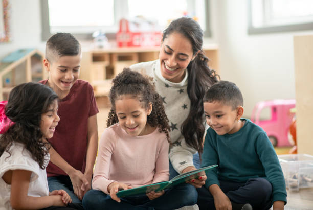 istock Fun During Story Time at Daycare 1344864129