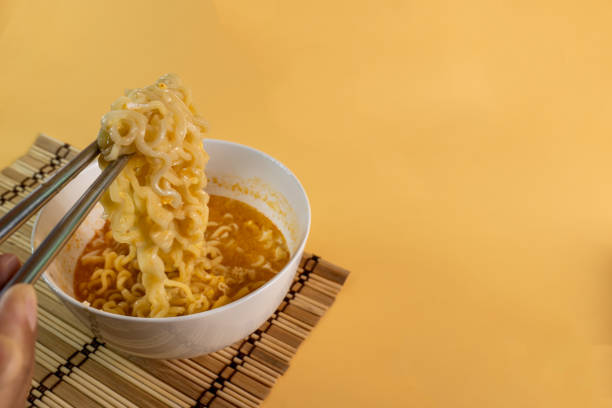 istock Instant noodles cooked with chopsticks can be eaten as a main dish or as an appetizer first as well. 1344866161