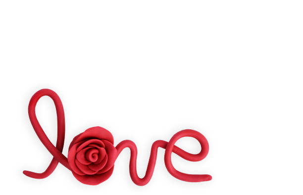 Red rose flowers made from plasticine.Happy Valentine's Day. This file includes clipping path.