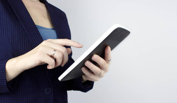 istock Hands Holding And Touching On Tablet Pc. Modern Gadget In Hand. Information Technology Concept. Internet Business Technology Concept 1344882687