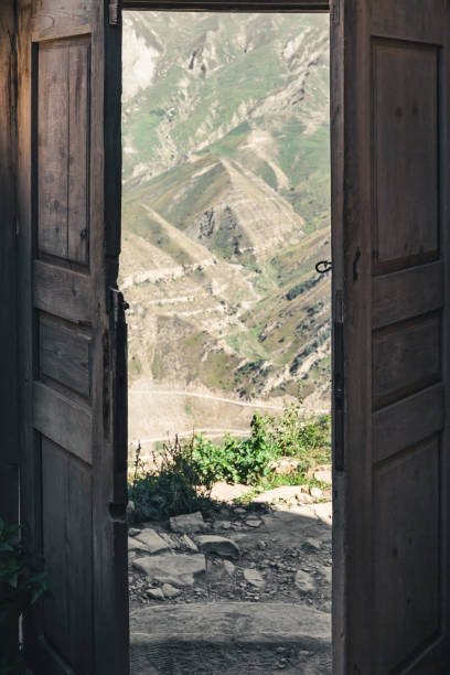 istock open wooden doors 1344886050
