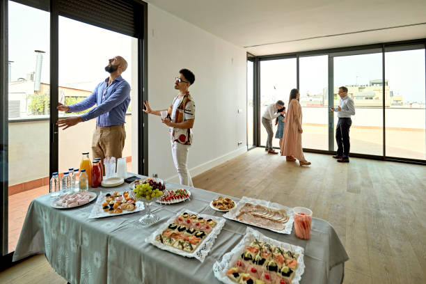istock Interested Buyers Examining Property and Talking with Agent 1344886171