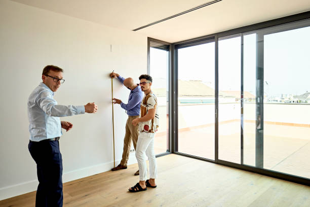 istock Real Estate Agent Interacting with Prospective Buyers 1344886214