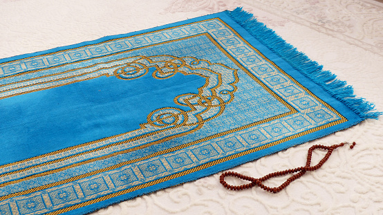 prayer rug and rosary used for worship in Islam,