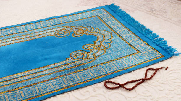 prayer rug and rosary used for worship in Islam, prayer rug and rosary used for worship in Islam, prayer mat stock pictures, royalty-free photos & images