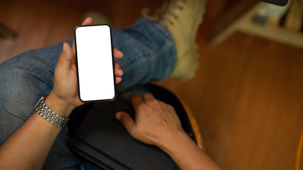 istock A hipster male freelancer using his smartphone to checking his work agenda 1344894616