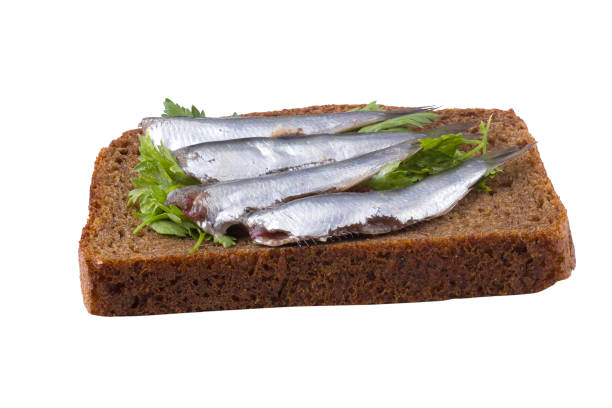 istock Black bread sandwich with Black Sea sprat carcasses with parsley 1344896108