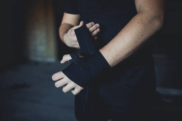 istock A kickboxing man trains alone in an abandoned building 1344896307
