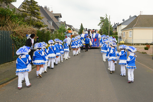 Hersel,Germany - February 07,2016: Children of the Carnival Association Blaue Funken in the Carnival Monday procession in the small village of Hersel near Cologne