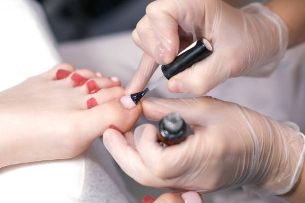 istock Nail polish on the feet. pedicure. Shellac 1344900570
