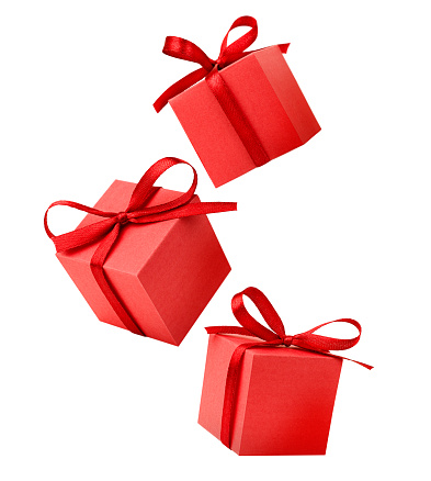 three red gifts on isolated white background