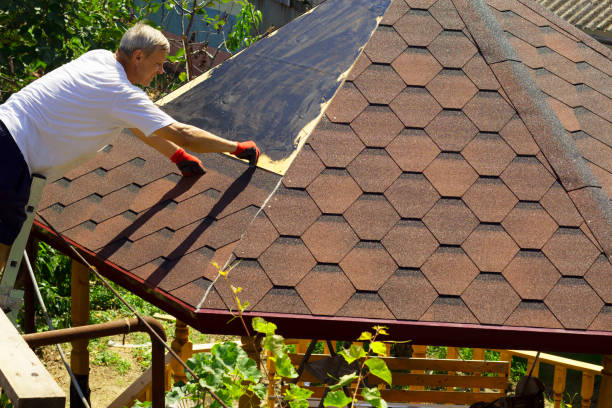 istock The roofer prepares the surface for fixing the tiles 1344901117