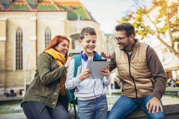 istock Young parents taking their little child to school 1344901284
