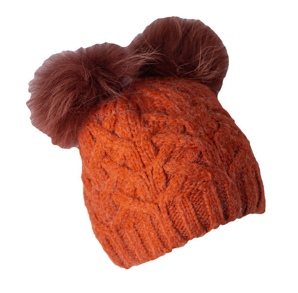 istock women's hat knitted with pompon isolated on white background. warm winter accessory 1344907671
