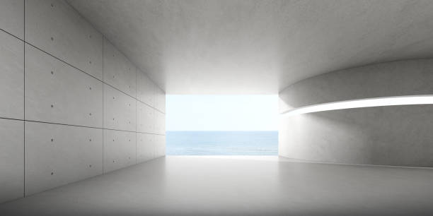 istock 3d render of empty concrete room with large window on the sea background. 1344907849