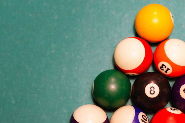 pool billiard balls close up. billiard balls on green billiard table - pool game imagens e fotografias de stock