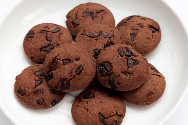 istock Chocolate chip cookies in white plate 1344909790