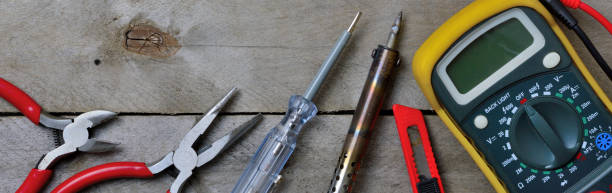 electrical repair tools close-up. view from above. banner electrical repair tools close-up. view from above. banner wire cutter stock pictures, royalty-free photos & images