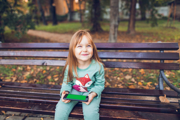 istock She is happy when she have smart phone in her hands 1344911851
