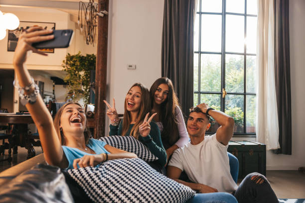 istock Friends taking a selfie on the couch 1344913100