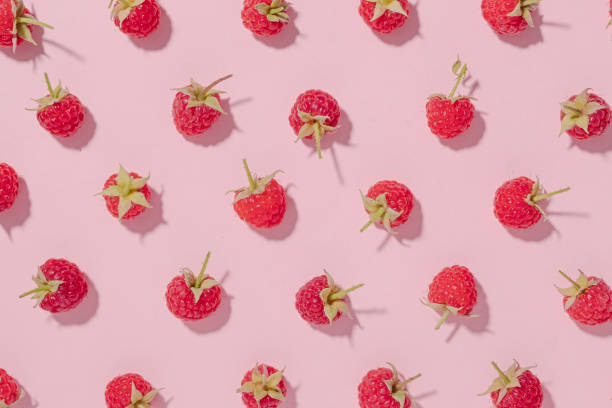 istock Fresh fruit background with ripe red raspberries 1344914952