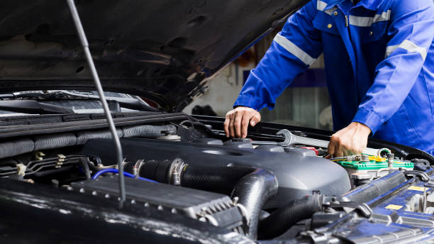 istock Car mechanic working on car engine, car maintenance concept. 1344916997