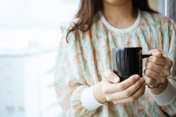 istock Woman drinking a coffee in the morning. 1344917434