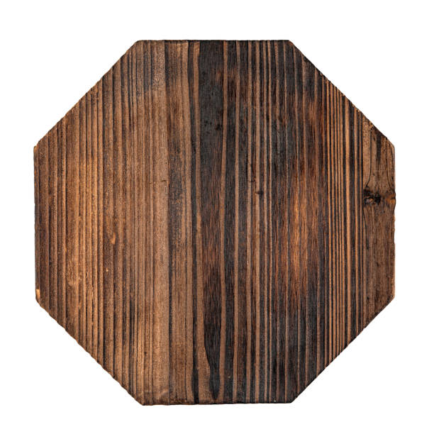 istock Isolated hexagonal burnt wooden serving board on white 1344917604