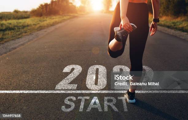 Sports Girl Who Wants To Start The New Year 2022 Concept Of New Professional Achievements In The New Year And Success Stock Photo - Download Image Now