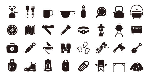Camping and Outdoor Gear Icon Set (Flat Silhouette Version) This is a set of camping gear icons. This is a set of simple icons that can be used for website decoration, user interface, advertising works, and other digital illustrations. folding chair stock illustrations