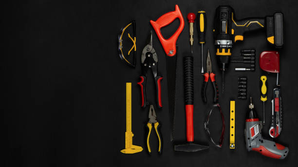 istock Cordless cordless drill - screwdriver with drill. Construction tools set. Black background. Goods for repair. Professional repair equipment. 1344923030