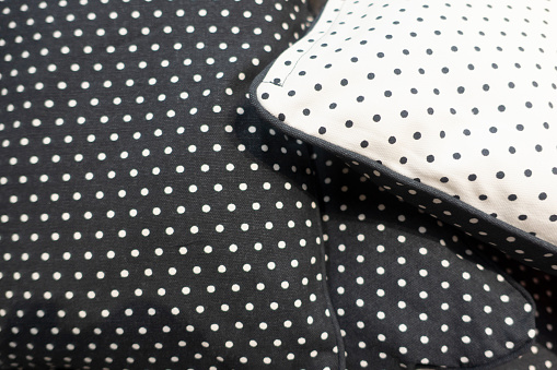Black and white pillows with polka dots  , close up