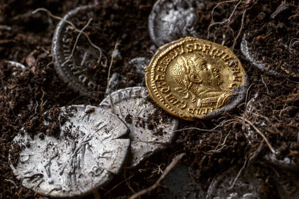 A treasure of Roman gold and silver coins.Trajan Decius. AD 249-251. AV Aureus.Ancient coin of the Roman Empire.Authentic  silver denarius, antoninianus,aureus of ancient Rome.Antikvariat. stock photo