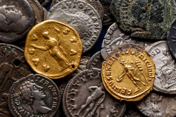 A treasure of Roman gold and silver coins.Trajan Decius. AD 249-251. AV Aureus.Ancient coin of the Roman Empire.Authentic  silver denarius, antoninianus,aureus of ancient Rome.Antikvariat. stock photo