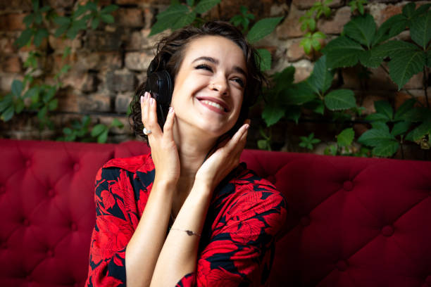 istock beautiful young woman relaxing at her office 1344928628