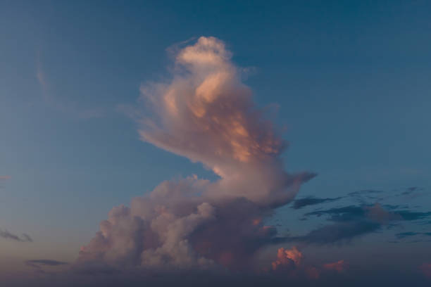 Beautiful colored cloudy evening sky. Sky with clouds at sunset. Seascape.
