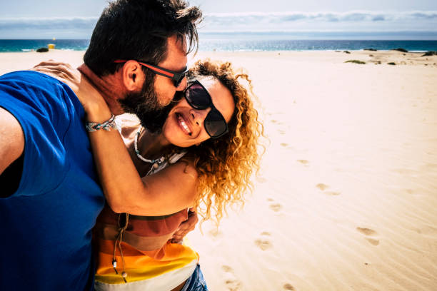 istock Couple Kissing On Beach 1344933889