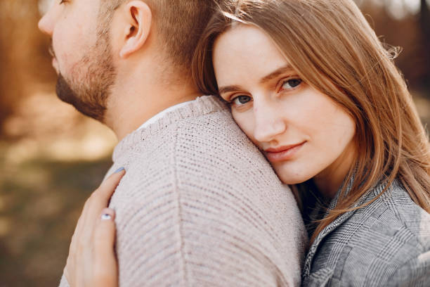 istock Beautiful couple spend time in a summer park 1344936807