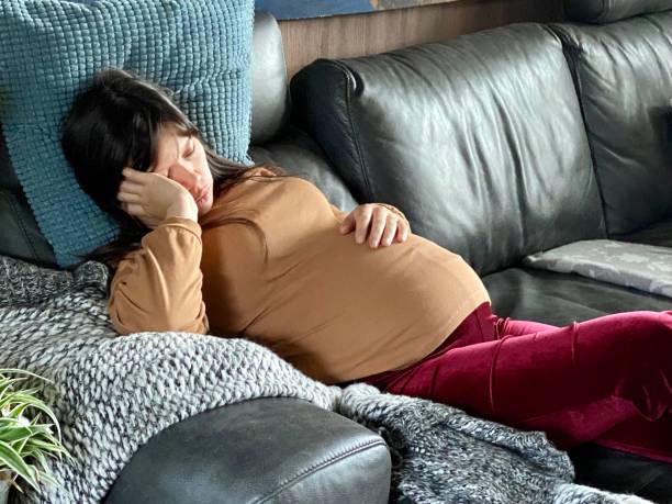 istock Sleeping pregnant woman 1344938999