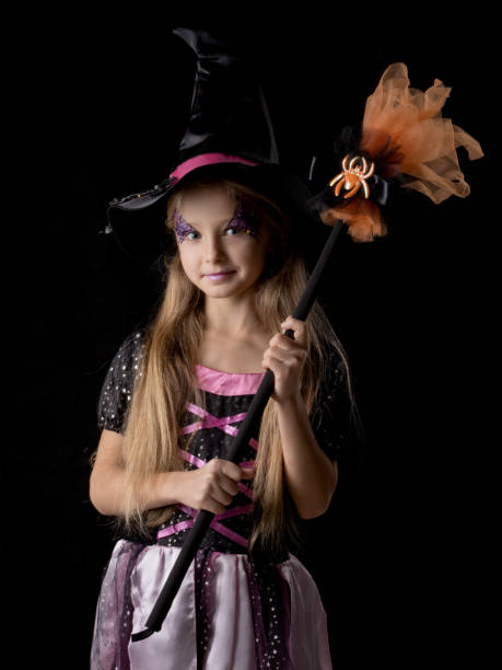 istock Cute halloween witch girl 1344939012