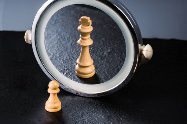 istock Pawn who sees himself king in the mirror 1344939759