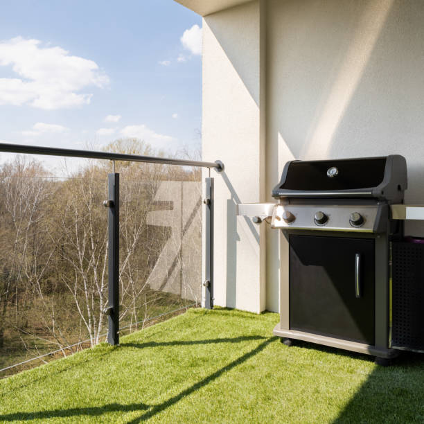 istock Stylish gas grill on spacious terrace 1344941706