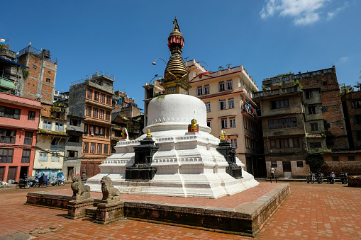 Kathmandu, Nepal - October 2021: View of a stupa in the center of a square near Durbar Square on October 4, 2021 in Kathmandu, Nepal.