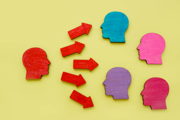 istock Influence and persuasion concept. Influencer and red arrows. 1344957205