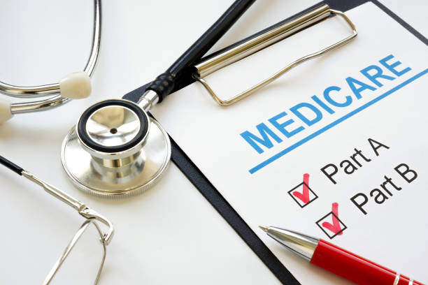 Medicare application form with marked plan A and B. stock photo