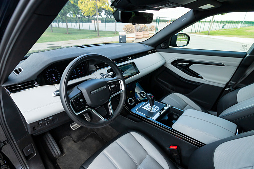 Istanbul, Turkey - August 17 2021 : Range Rover Evoque is a subcompact luxury crossover SUV produced by the British manufacturer Land Rover marque. It has luxury interior design.