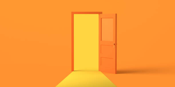 istock Open door with light on orange background. Copy space. 3D illustration. 1344957783